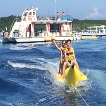 inflatable banana boat 4 people playing on the beach surf riding water game water toys summer necessary water park inflatable banana boat 4 people playing on the beach surf riding water game water toys summer necessary water park