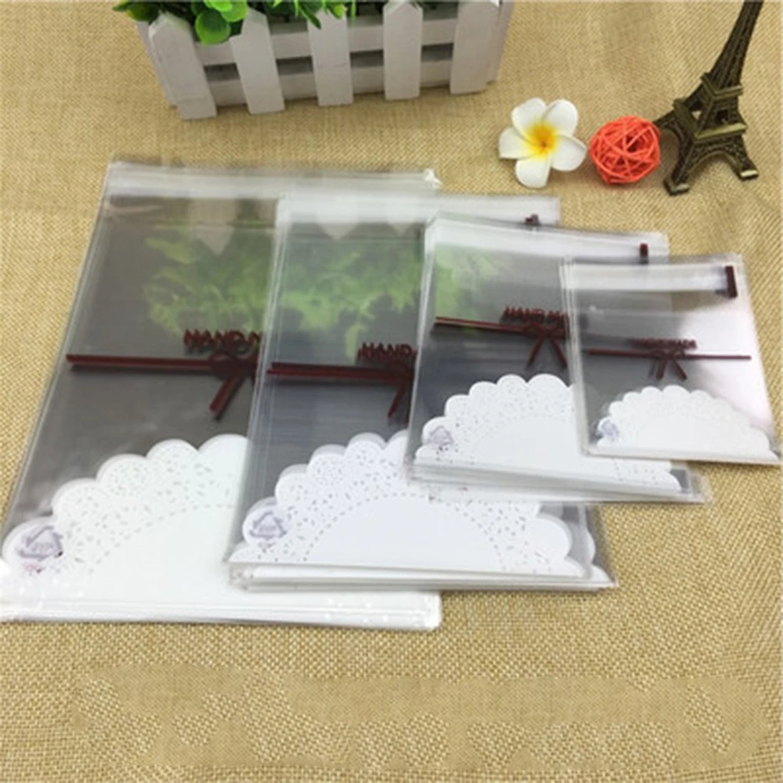 

Hot Sale 100 pcs Lovely lace bow Print Gifts Bags Christmas Cookie Packaging Wedding Cookie Candy Self-adhesive Plastic Bags