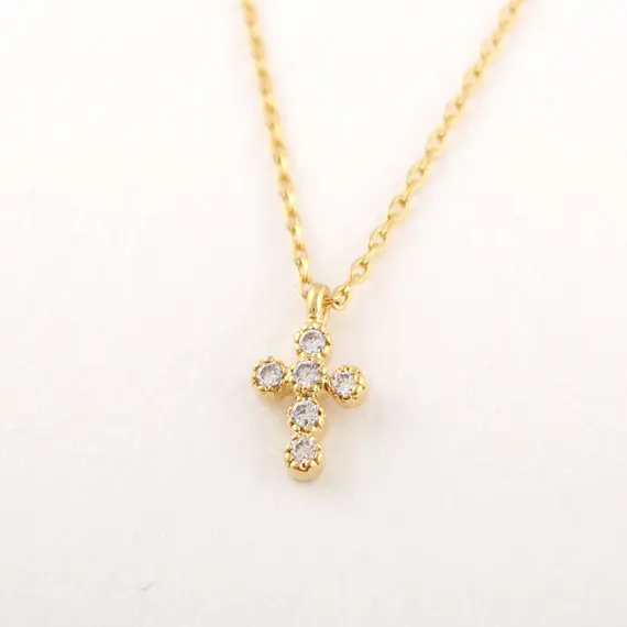 Rhinestone Cross Necklace In Gold.jpg