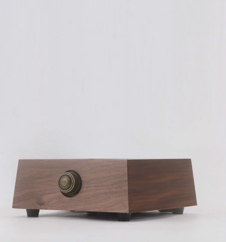 Hot Plates The small boiled tea stove in walnut doesn't pick the kettle to make tea. Hot Plates The small boiled tea stove in walnut doesn't pick the kettle to make tea.