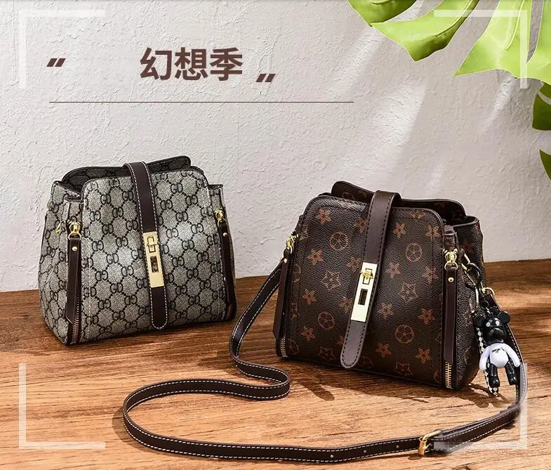 

Shangxin small bag lady, new autumn and winter fashion Korean version of Baitao fashionable bucket lady one shoulder inclined ba