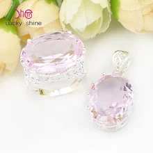 Top jewelry special oval rosa sintético topaz gem colgantes anillos de sistemas de la joyería de ee. uu. rusia canadá australia pendientes de la boda