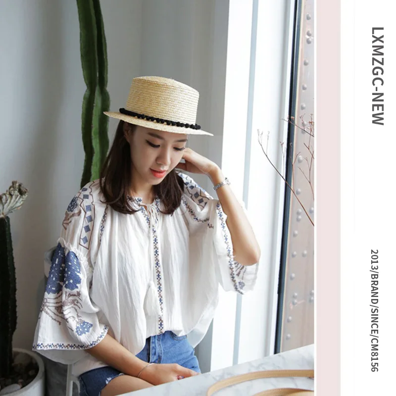 

New ladies summer beach vacation sun hat Wild flat top small hair ball straw straw hat for parent-child