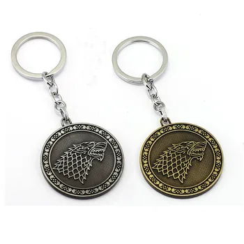 

12pcs/lot Keychain House Stark Movie Key Ring Winter Is Coming shield round coin wolf head Key Holder Chaveiro