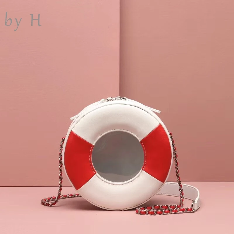 

by H 2019 new arrival summber transparent swing ring cute shoulder bag luxury designers jelly bag fashion Novelty round handbag