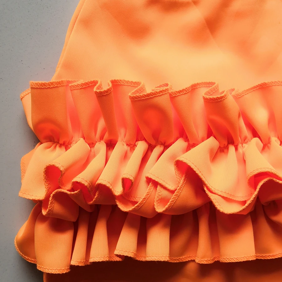 neon orange ruffle top