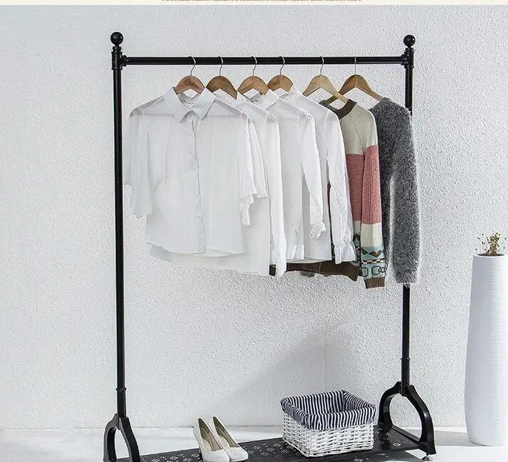 Tieyi clothing store. Display rack. Male and female children's wear double pole lift and floor type with wheel hanger.1