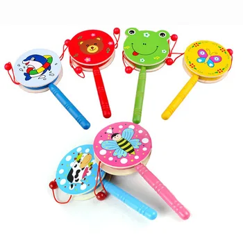 

Preschool children wooden toys wooden rattle traditional musical toys wooden baby rattles Drum Musical Hand Bell Drum Toy