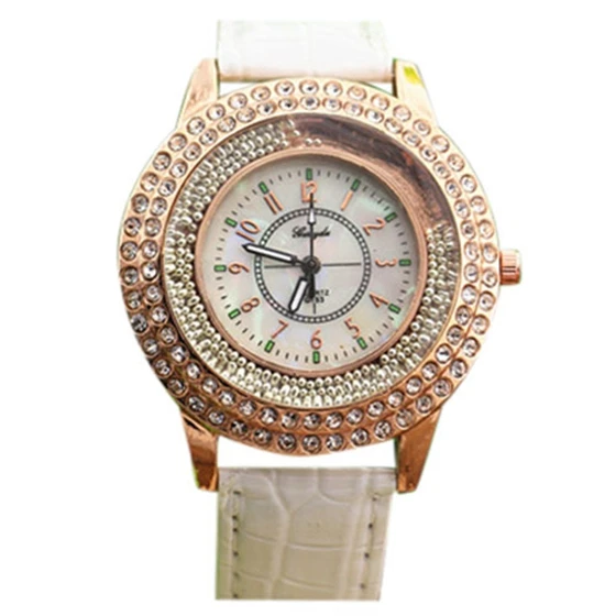 

Gerryda lady fashion watch,rhinestone deco case with gold plated.moving sand stone in case,PU leather band