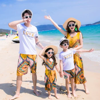 

summer 2018 family matching outfits mom and daughter dress father son t shirt bohemian vintage dress yellow flower beach pants