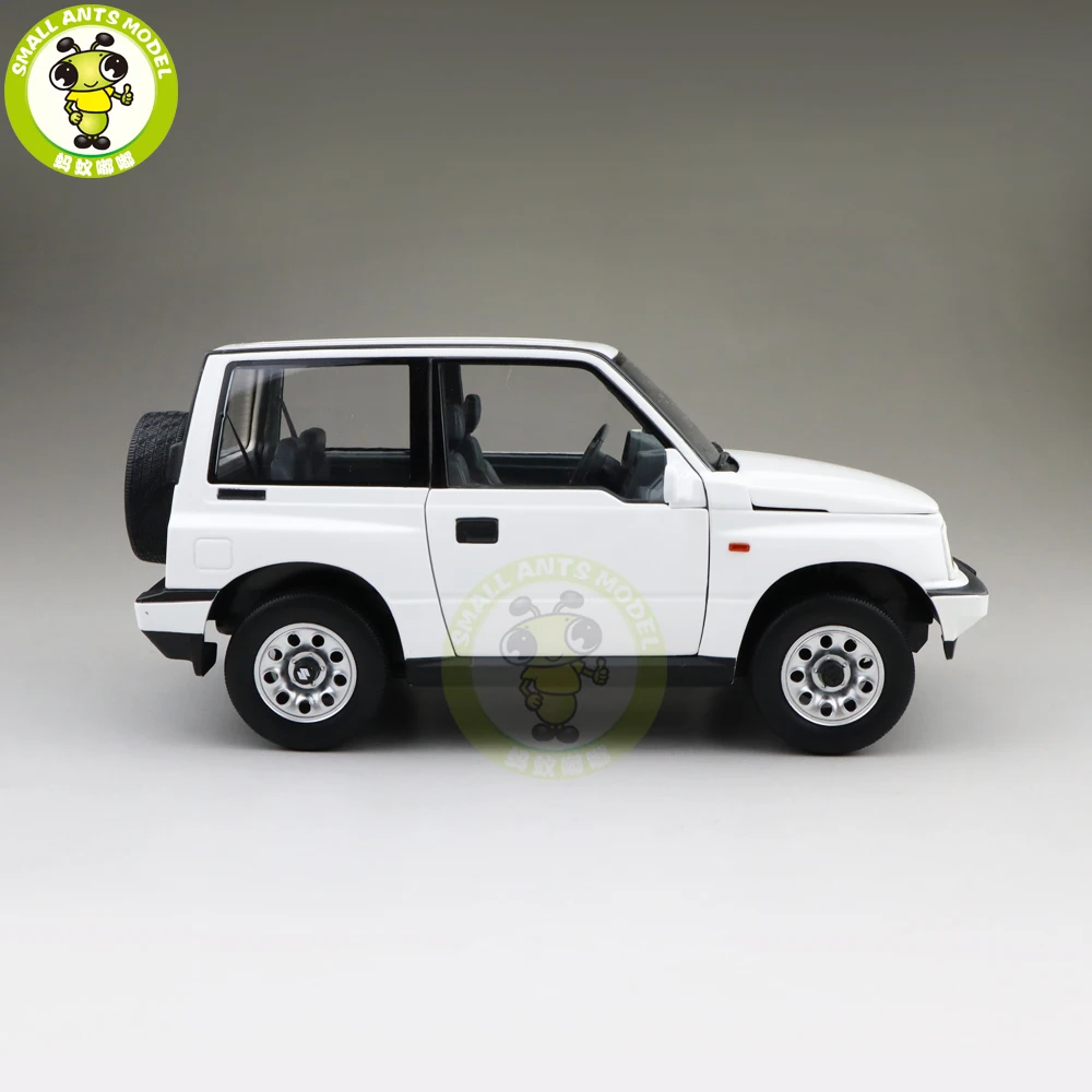 1/18 DORLOP Suzuki Vitara Escudo с левым приводом Модель автомобиля игрушки детские подарки для мальчиков девочек белого цвета