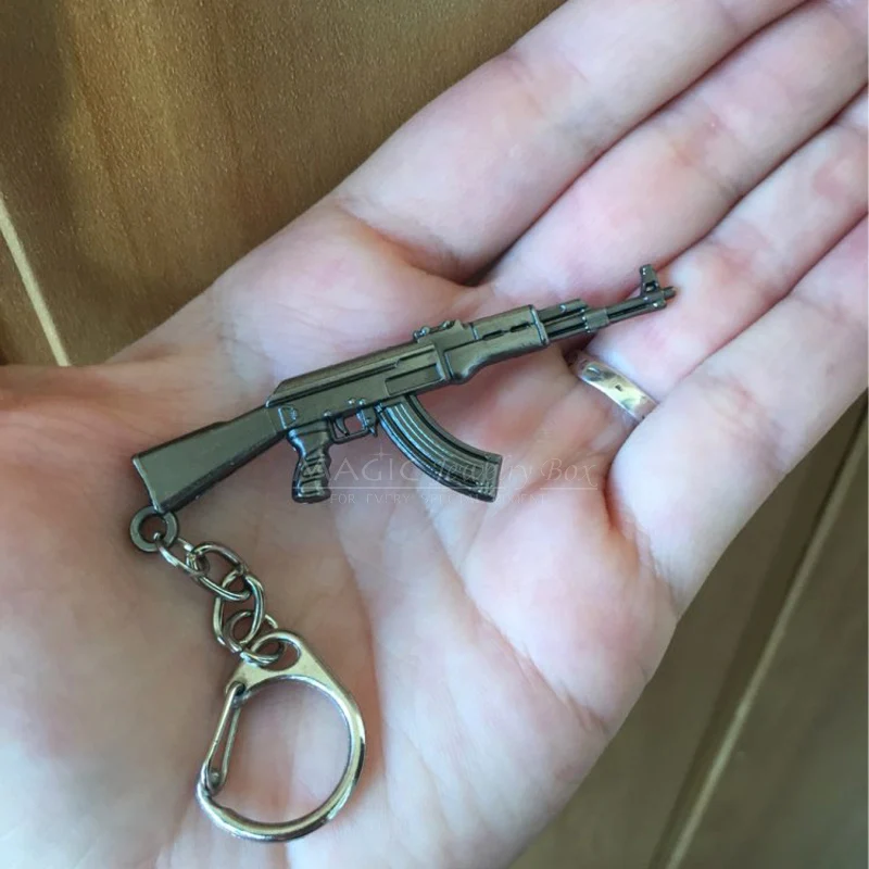 Фото Новинка брелок для ключей с пистолетом Counter Strike AK47 мужской брелок для ключей с винтовкой Awp снайперской CS GO Saber мужской брелок для ключей с сумкой №3