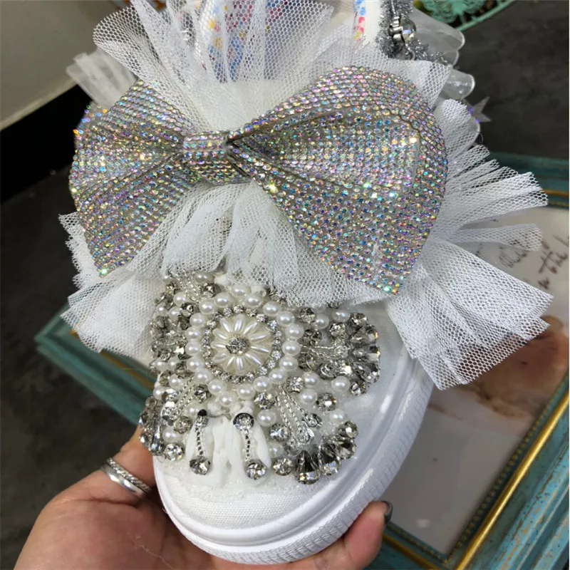 

Original heavy work super flash rhinestone bow lace exaggerated cute inside thickening casual canvas shoes