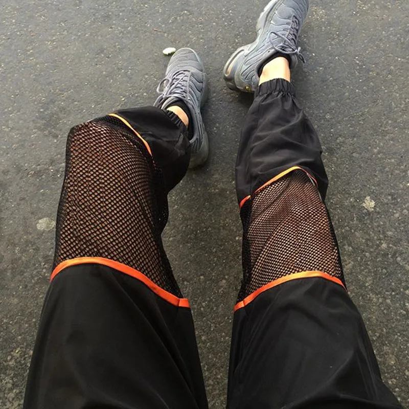 Спортивные брюки с сеткой женские