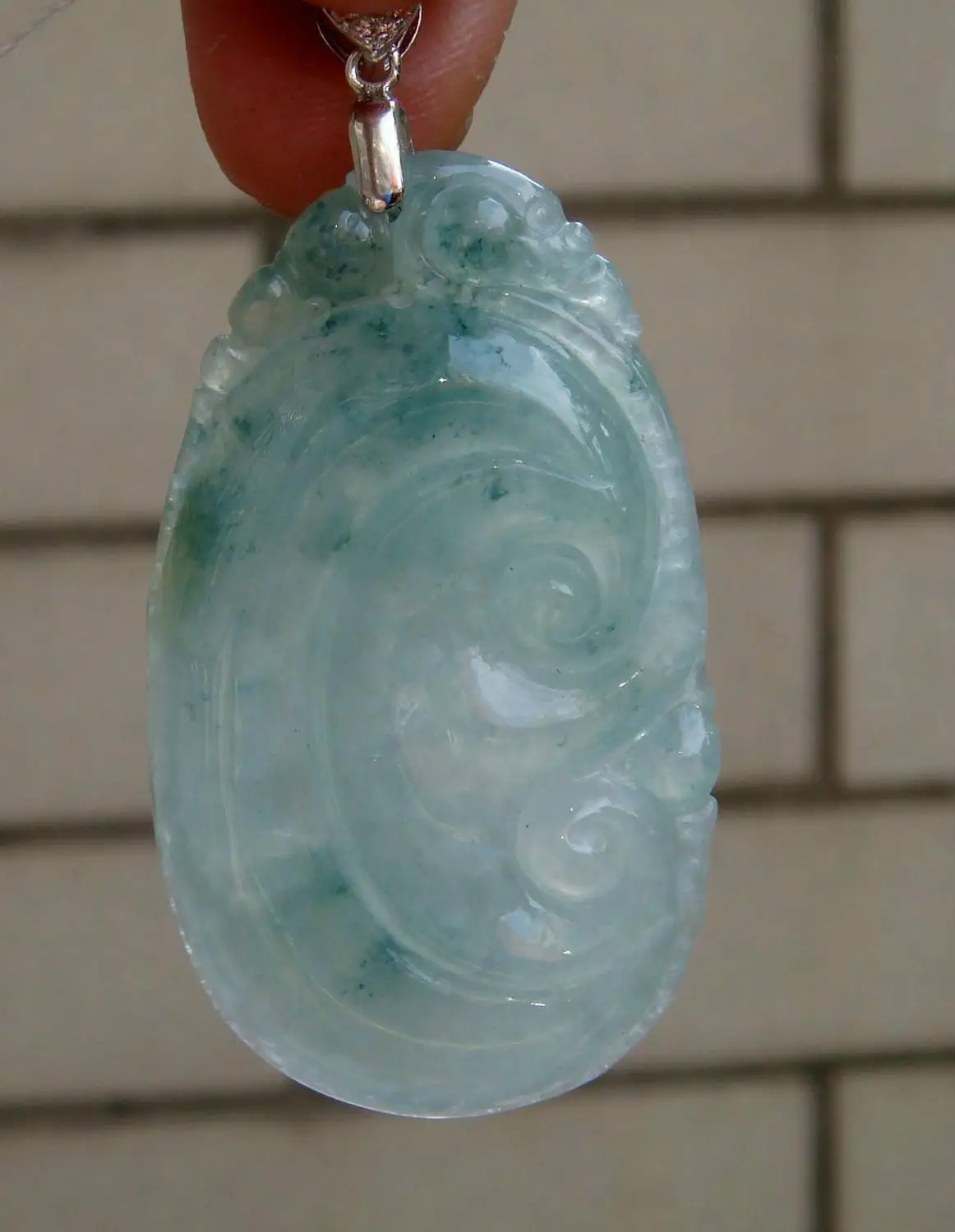 

Free shipping HK Certified Icy Translucent Floral Jadeite Ruyi 925 SilverPendantGrade A