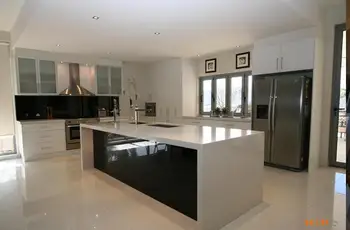 

Australian kitchen cabineit furniture with black backsplash