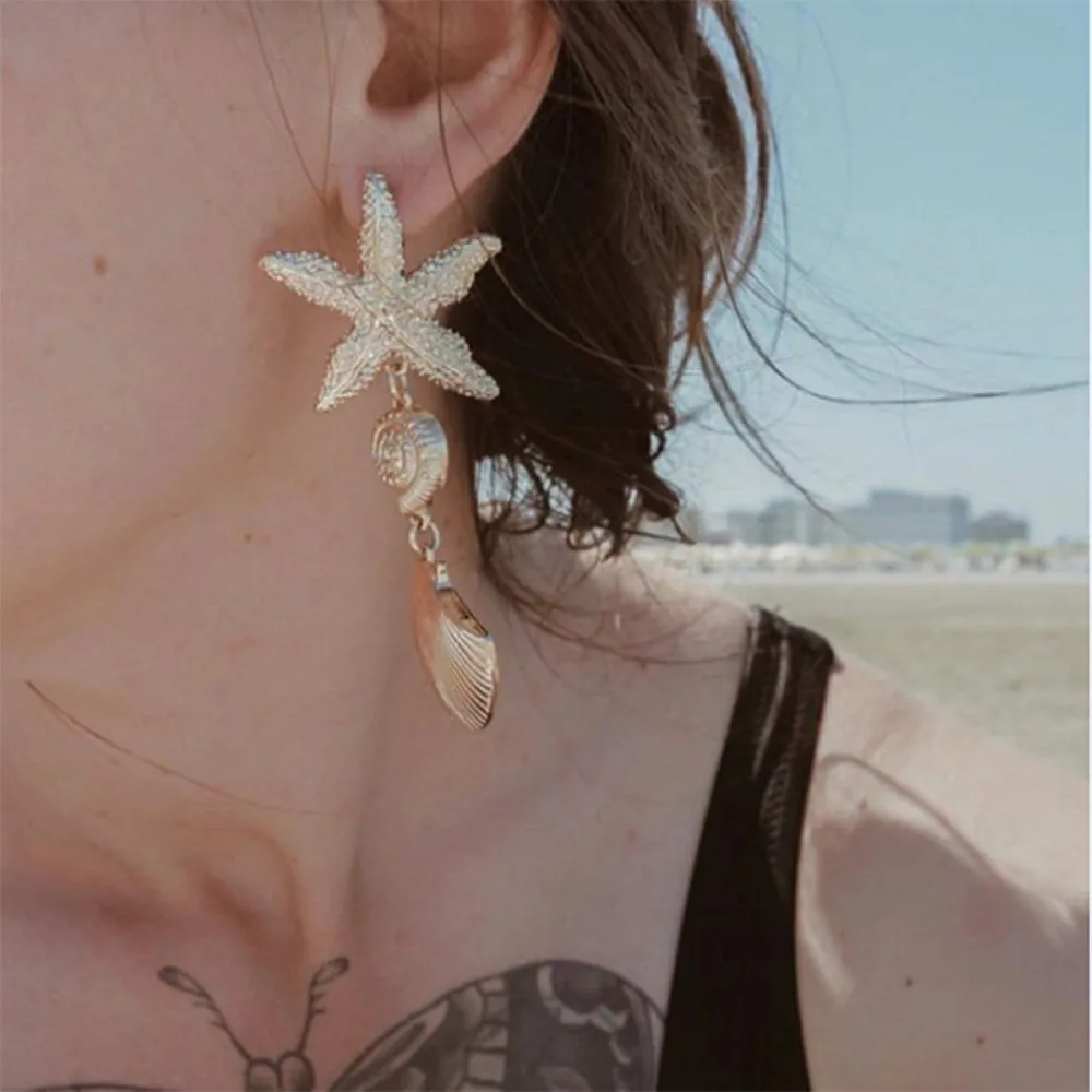 

Summer Bohemia Style Asymmetry Sea Star Shell Drop Dangle Earrings Gold Metal Starfish Conch Statement Earrings For Women Gifts