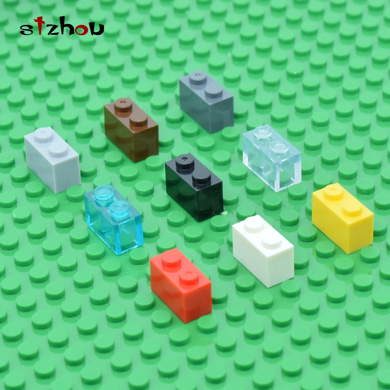 

100PCS/lot Brick 1x2 DIY enlighten block bricks Compatible With Assembles Particles