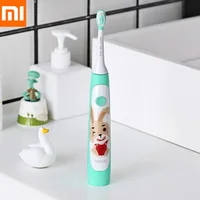 Электрическая зубная щетка