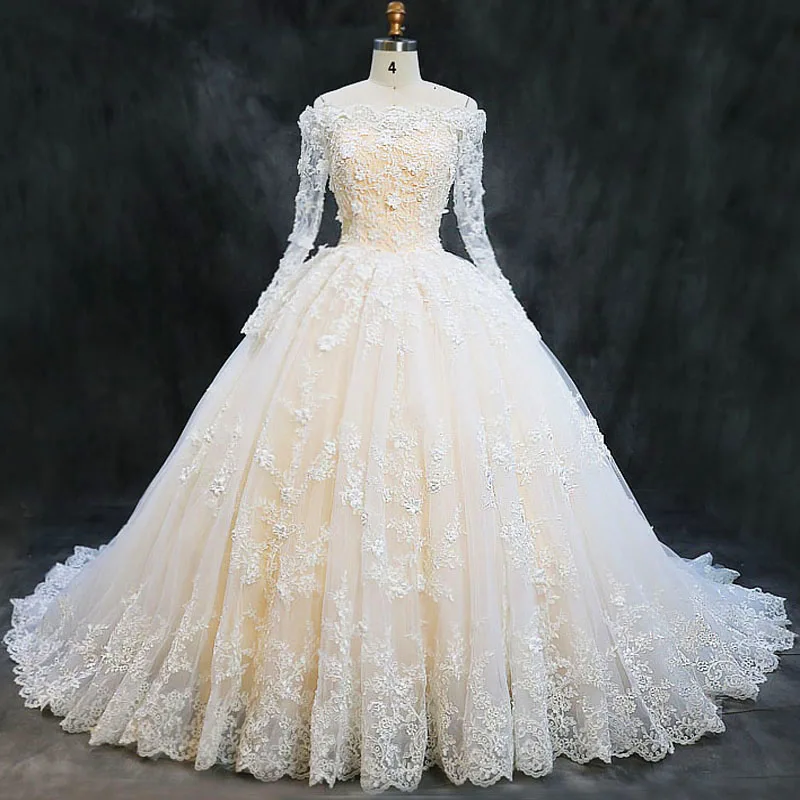 

Luxury Boat Neck Long Sleeve Lace Appliques Flowers Puffy Champagne Wedding Dress 2019