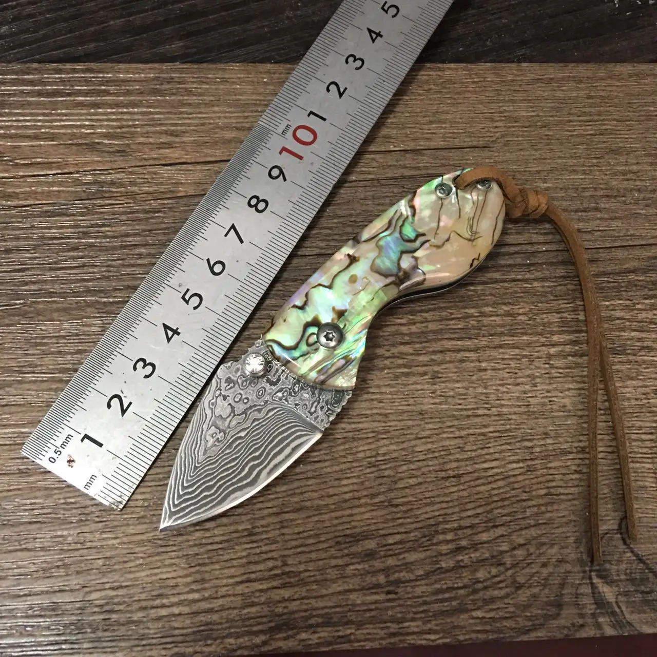 

Outdoor pocket defense Damascus knife folding knife pattern steel shell handle exquisite sharp gift knife