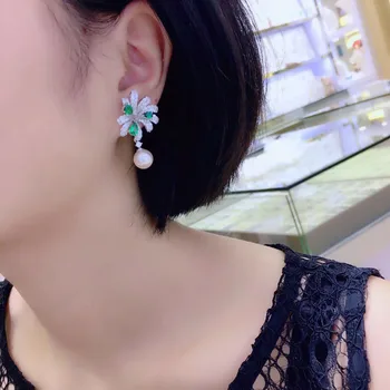 

Qi Xuan_Jewelry_New Earrings Flower Earrings S925 Silver Inlay Zircon Elegant And Irregular Irregular_Factory Direct Sales
