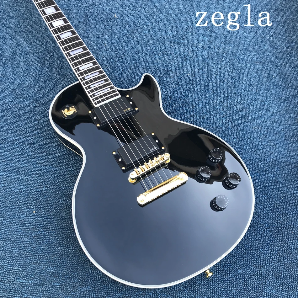 

Free shipping, black Hot electric guitar, EMG pickup, gold hardware, customizable guitar