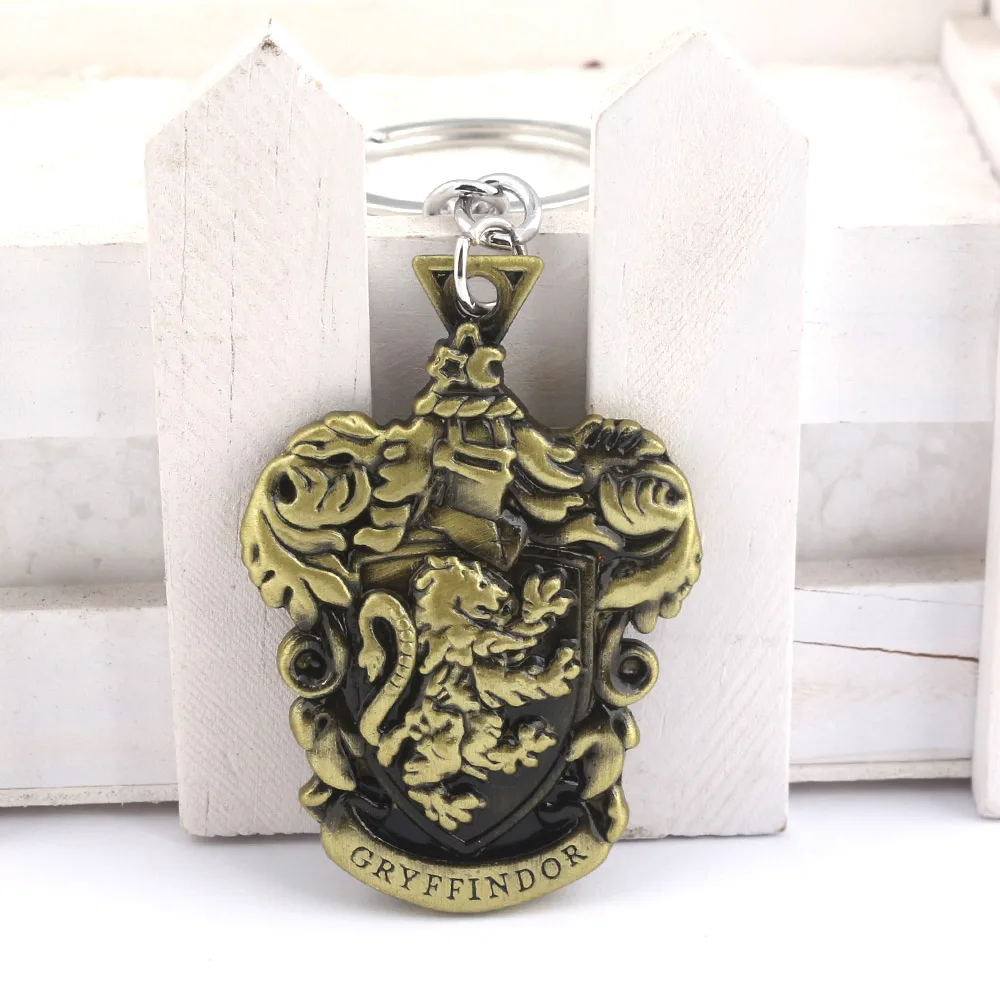 

Movie HP House of Hogwarts School Badge Keychain Ravenclaw Gryffindor Hufflepuff Charms Key Chains Women Men Car Keyring Gift