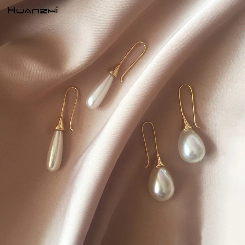 

HUANZHI 2019 New Korean Faux Pearl Geometric Waterdrop Oval Retro Ear Hook Drop Earrings for Women Girl Wedding Vacation Jewelry