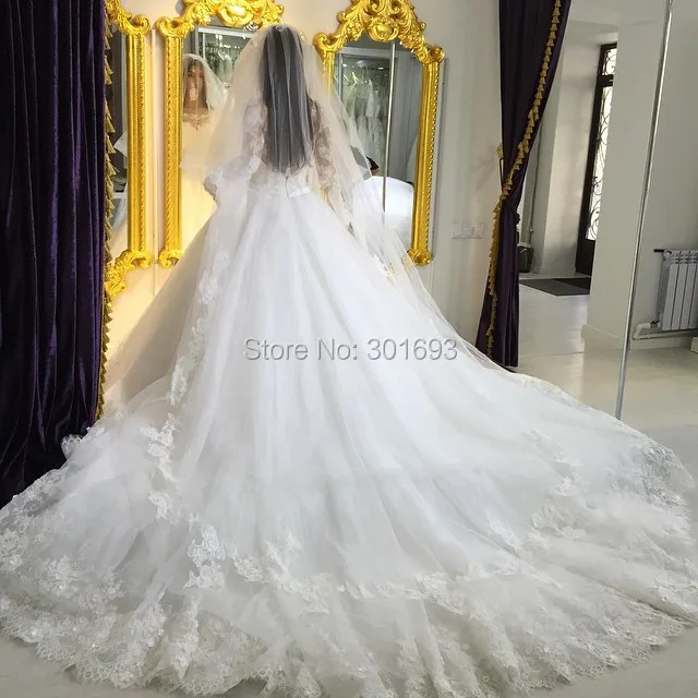Oumeiya Ow325 With Long Veil Soft Tulle French Lace Liqued Ball Oumeiya Ow614 New Arrival Boat Neckline Off The Shoulder Three Quarter Sleeves Catherdral Royal Train Luxury Wedding Dress 2016usd 499 00 Piece