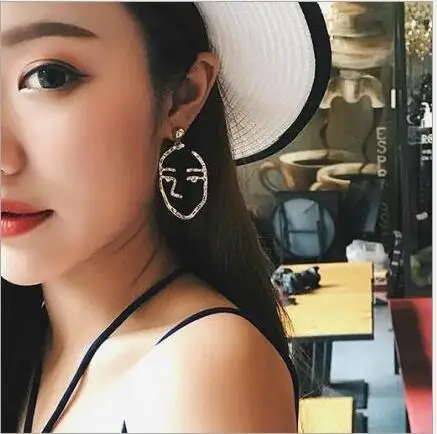 

Retro Models Europe Exaggerated Personality Metal Face Earrings Fashion Facebook Profile Modeling Earrings For Women