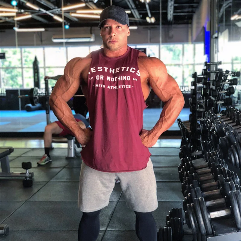 

new brand trends Gyms Tank Tops Men loose Elastic Cotton Vest O-Neck Gyms Tank Top Men Sleeveless Shirts Muscle Men Fitness Tops
