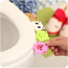 Set de baño de Dibujos Animados Dispositivo de Elevación de Baño Tapa Del Inodoro Tapa Del Inodoro Baño Asiento Elevador Portátil Plegable Titular Accesorios