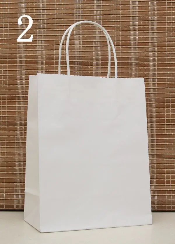 

Free Shipping 27*21*11cm White Kraft Paper Gift Bag,Festival gift bags,Paper bag with handles, wholesale price 50pcs/lot