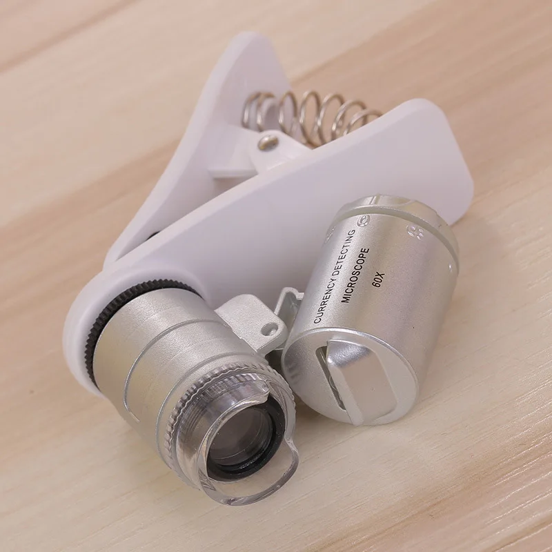 

60X Zoom LED UV Light Universal Mobile Phone Loupe Lens Magnifier Micro Zoom Lens JH1 with Clip For iPhone HTC Tecno Microscope
