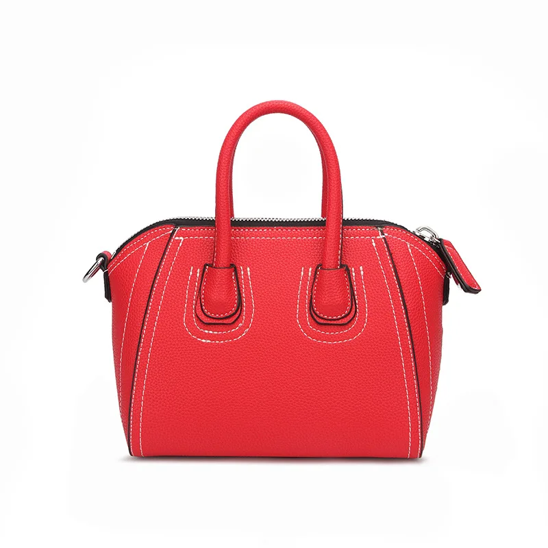 Simple solid color fashion brand Korean smiley face designer handbags high quality lychee soft face Genuine Leather women bag