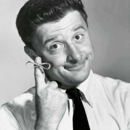 Portrait of a businessman smiling with a string tied around his finger Poster Print (18 x 24)