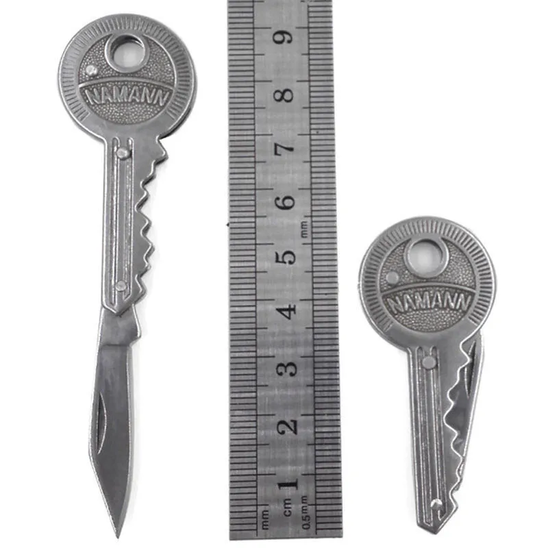Nuevo 1 pieza Mini clave cuchillo plegable bolsillo cuchillo clave cadena cuchillo pelador portátil acampada llave anillo cuchillo al aire libre herramienta de supervivencia