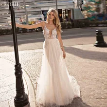 Best Price LORIE Boho Wedding Dresses Appliqued with Lace V Neck Beach Wedding Gown Spaghetti Strap Backless Free Shipping Bridal Gown 2019 Best Price LORIE Boho Wedding Dresses Appliqued with Lace V Neck Beach Wedding Gown Spaghetti Strap Backless Free Shipping Bridal Gown 2019