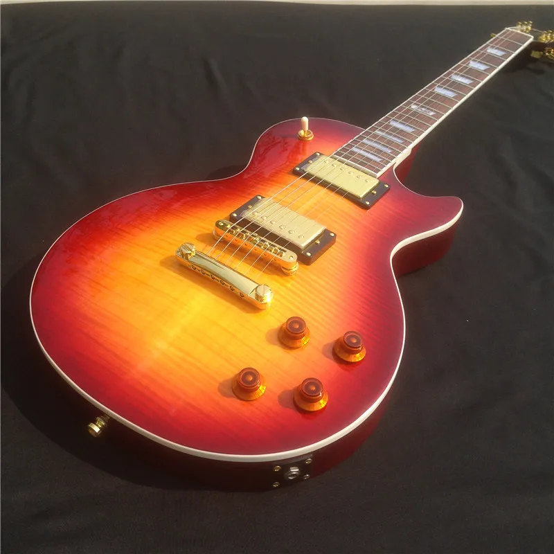 

The wholesales red color electric guitar with rosewood electric guitar fingerboard and gold pickups for performance