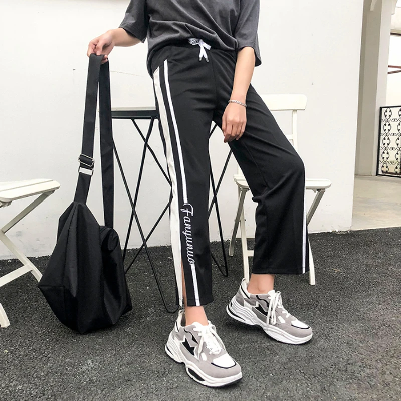 Женские спортивные штаны с эластичной резинкой на талии черные красные