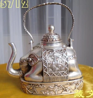 

Healing buddhist bronze coated silver elephant shape figure teapot 13 cm tallGarden Decoration 100% real Tibetan Silver Brass