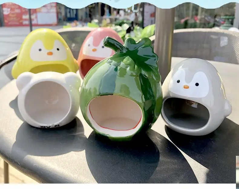 

Penguin Cat head -shaped hamster ceramic nest summer cooling supplies sleeping nest small hedgehog golden bear cooling pad