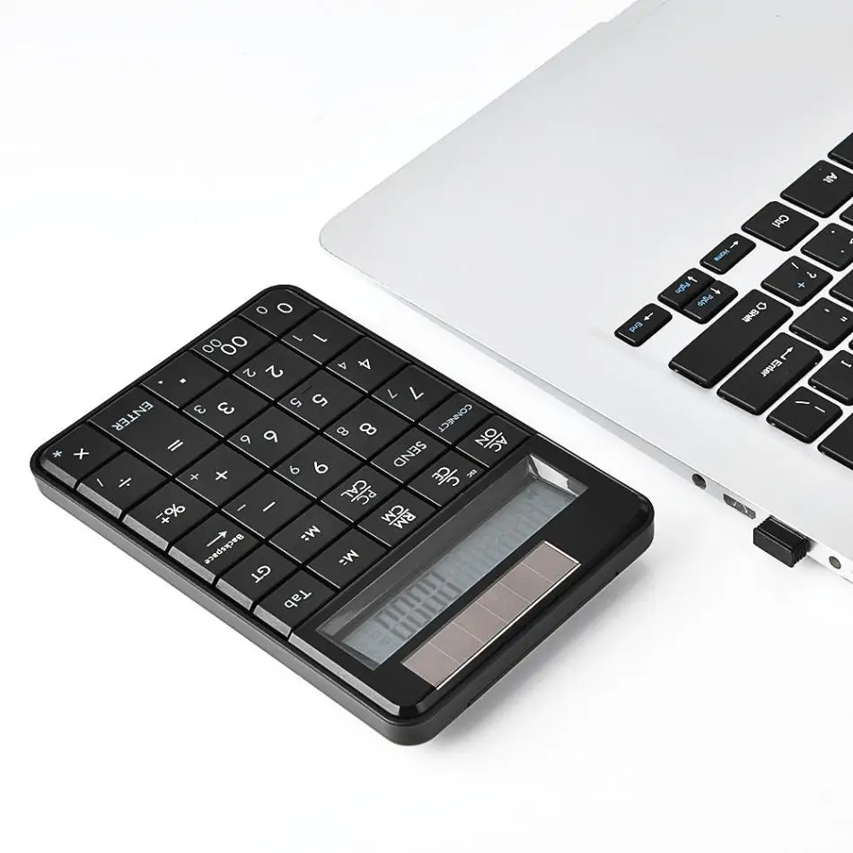 

29 Keys Mini 2.4G Wireless Wireless Numeric Keyboard Multifunctional Keyboard with Calculator and LCD Display for Laptop
