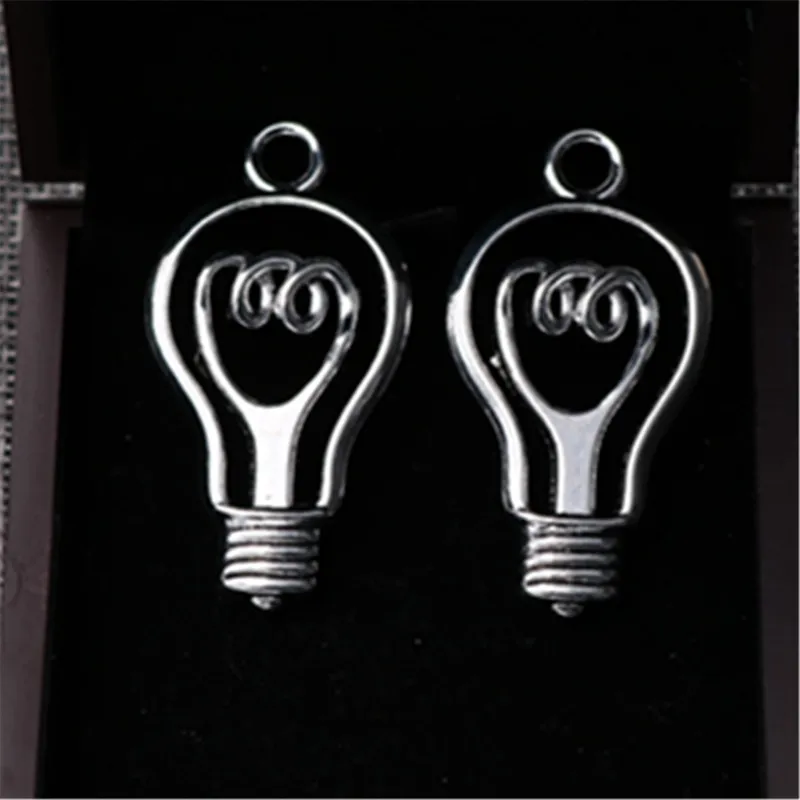 

WKOUD 4pcs Silver color 41*24mm Hollow Threaded Bulb Charm Necklace Bracelet DIY Vintage Jewelry Alloy Pendants A95