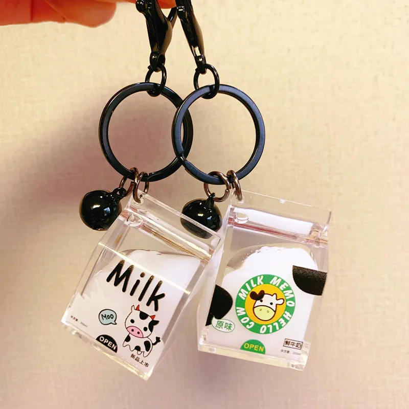 

Creative cute Dairy Cow Milk Drink sequins acrylic Keychain Moving Liquid oil Drop decompression drift bottle Jewelry Best Gifts