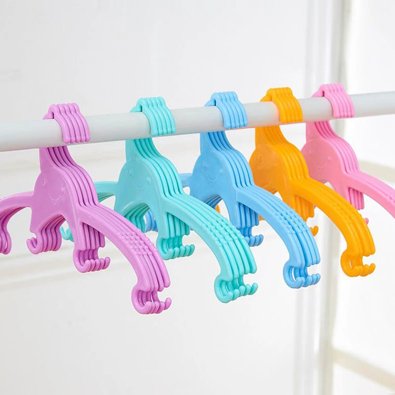 Cintre A Vetements En Plastique Pieces Motif De Poulpe Colore Dessin Anime Mignon Pour Nouveau Bebe Petit Joli Cintre Pour Enfants Aliexpress