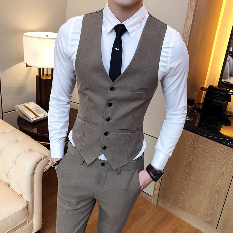 light grey suit black waistcoat