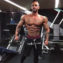 Новые мужские фитнес бодибилдинг хлопковые шорты мужские спортивные залы Тренировка по колено короткие мужские брюки повседневные Модные Jogger брендовая спортивная одежда