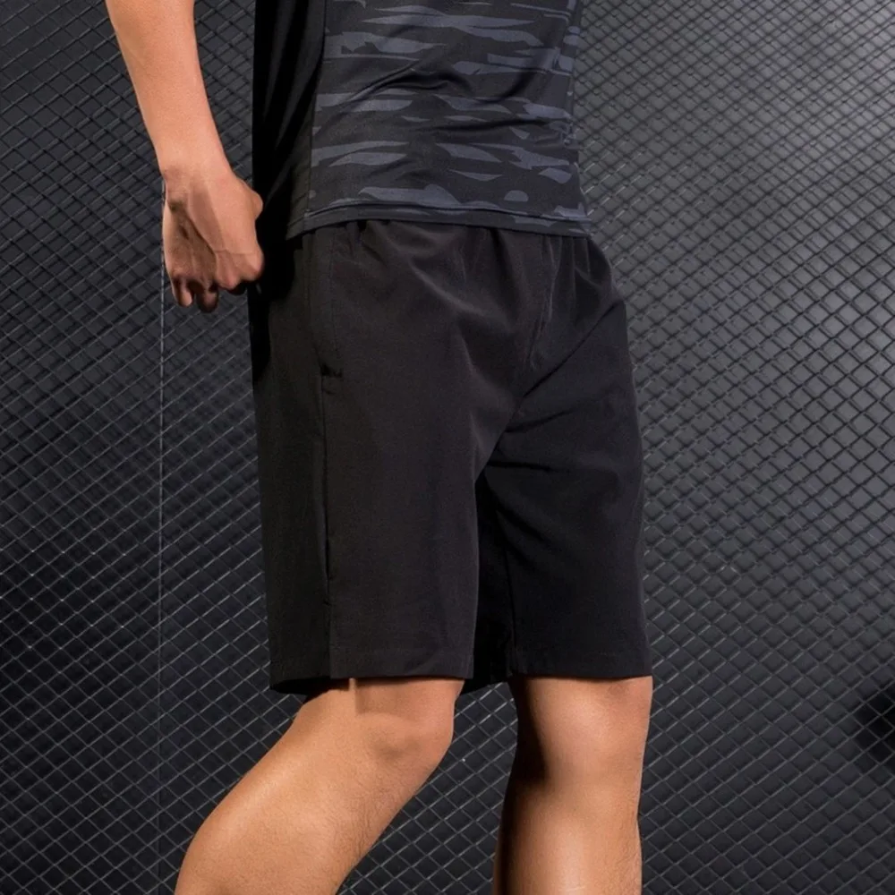

Fannai Men Quick Dry Sports Shorts with Zipper Pockets Knee-Length Pants Breathable Reflective Design Active Shorts FN107D